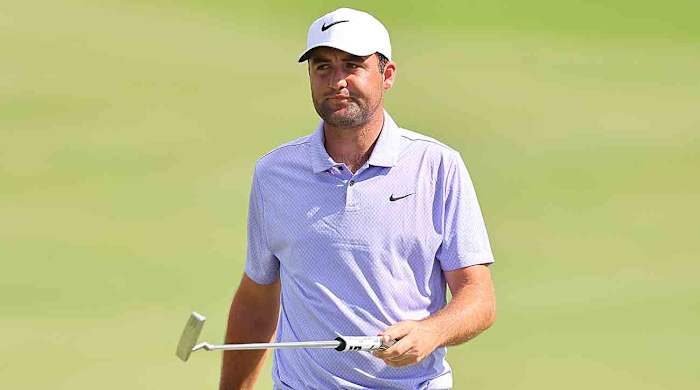 Scottie Scheffler reacts to a missed birdie on the 17th green during the final round of the 2024 Sentry at Plantation Course at Kapalua Golf Club in Kapalua, Hawaii